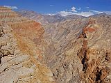 Mustang 02 05 Deep Canyon Before Tetang The drop-offs on the side of the trail were staggeringly steep and a bit dangerous, with views of the 1000m deep canyons, as we neared the descent to Tetang from Tange. Don�t get too close!